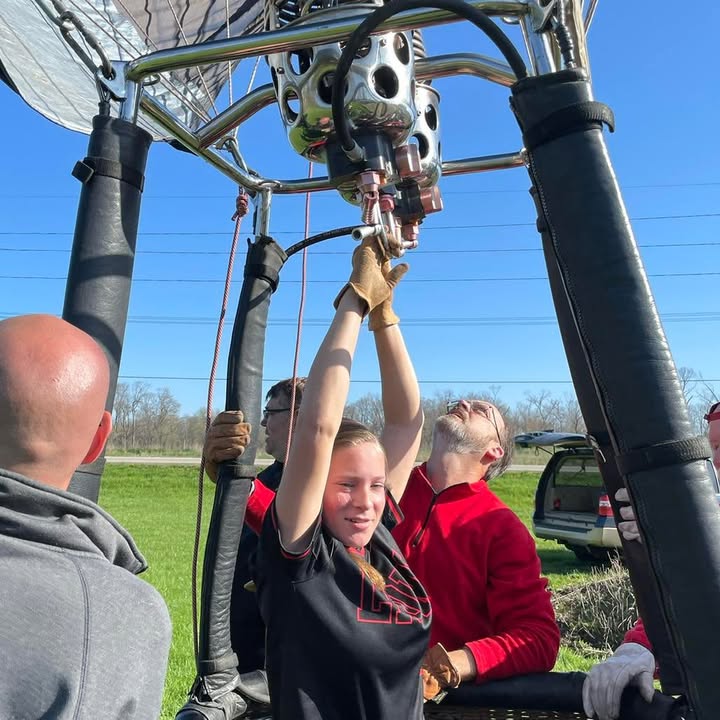 Meg and her softball team showed up this morning to help with the balloon.