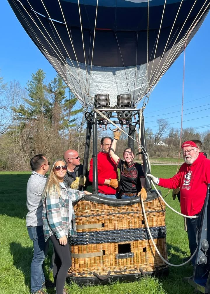 Meg and her softball team showed up this morning to help with the balloon.