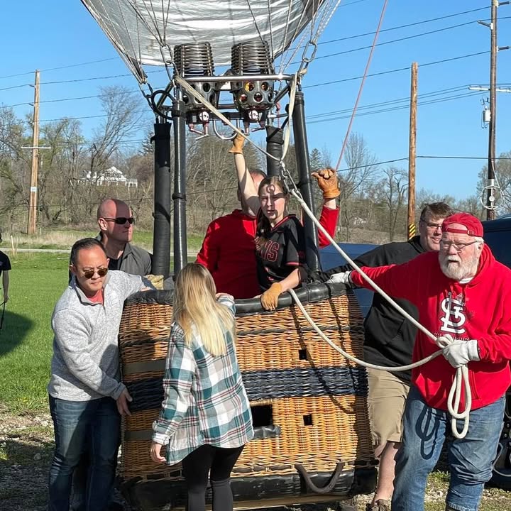 Meg and her softball team showed up this morning to help with the balloon.