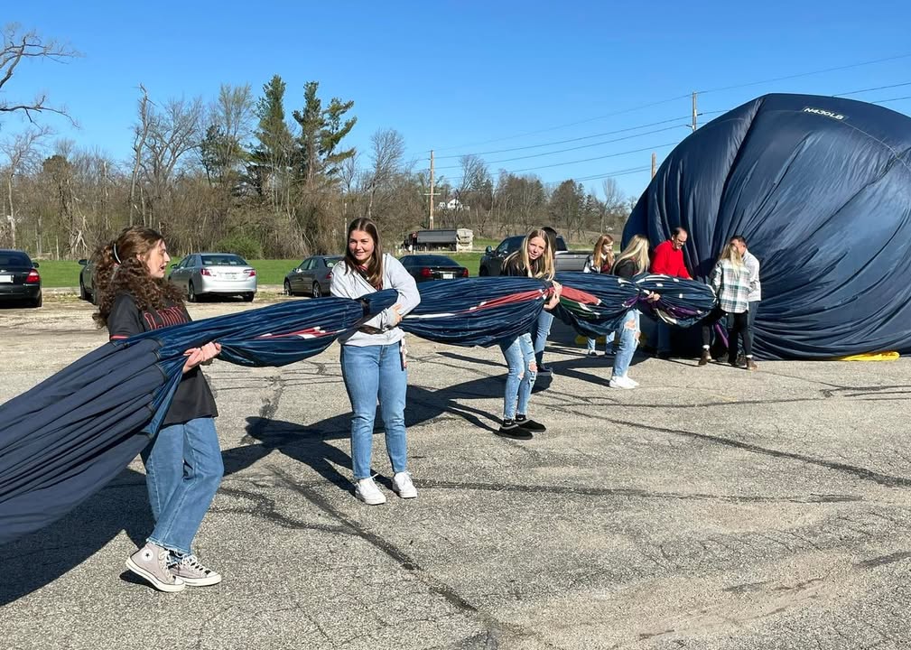 Meg and her softball team showed up this morning to help with the balloon.