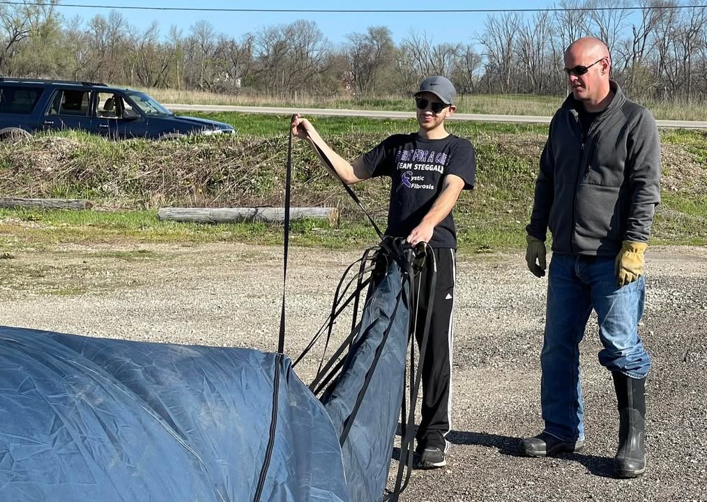 Meg and her softball team showed up this morning to help with the balloon.
